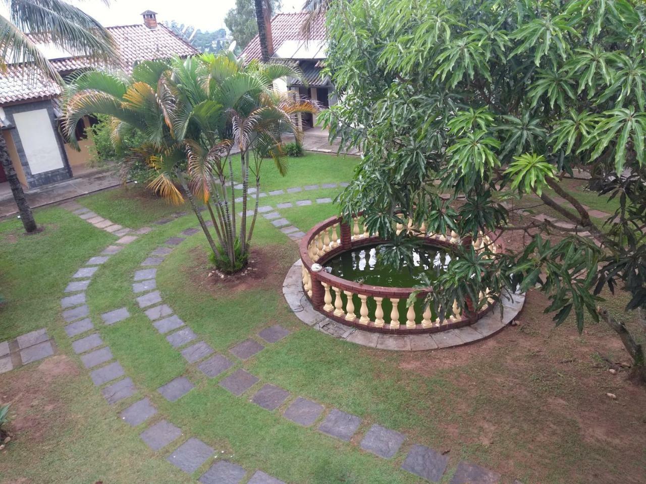 Pousada Nossa Senhora Penedo  Exterior foto The garden of the house