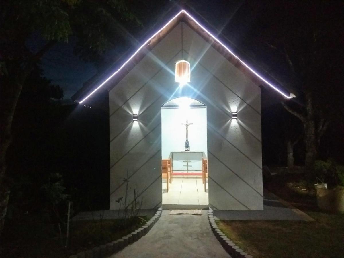Pousada Nossa Senhora Penedo  Exterior foto The Chapel of the Holy Cross at night