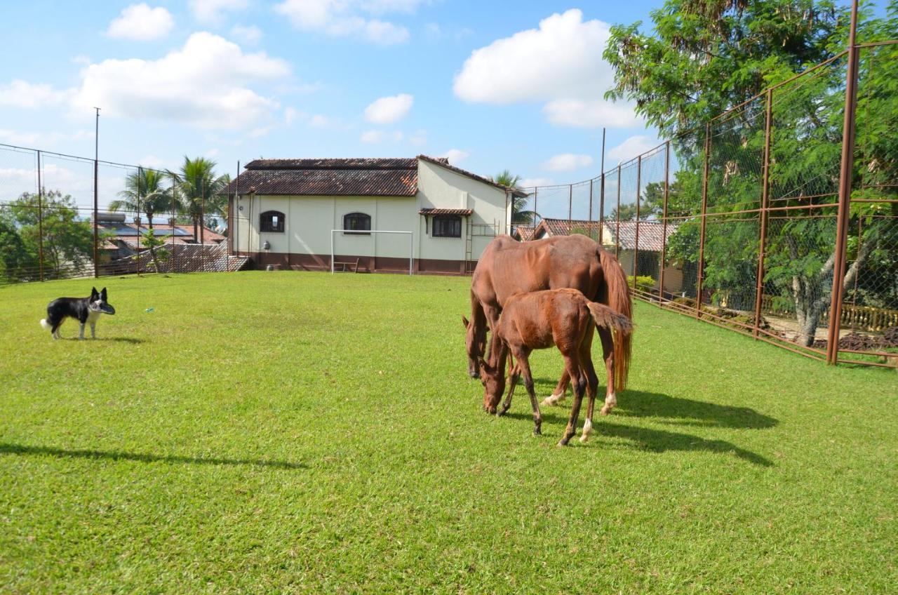 Pousada Nossa Senhora Penedo  Exterior foto A horse farm in the city
